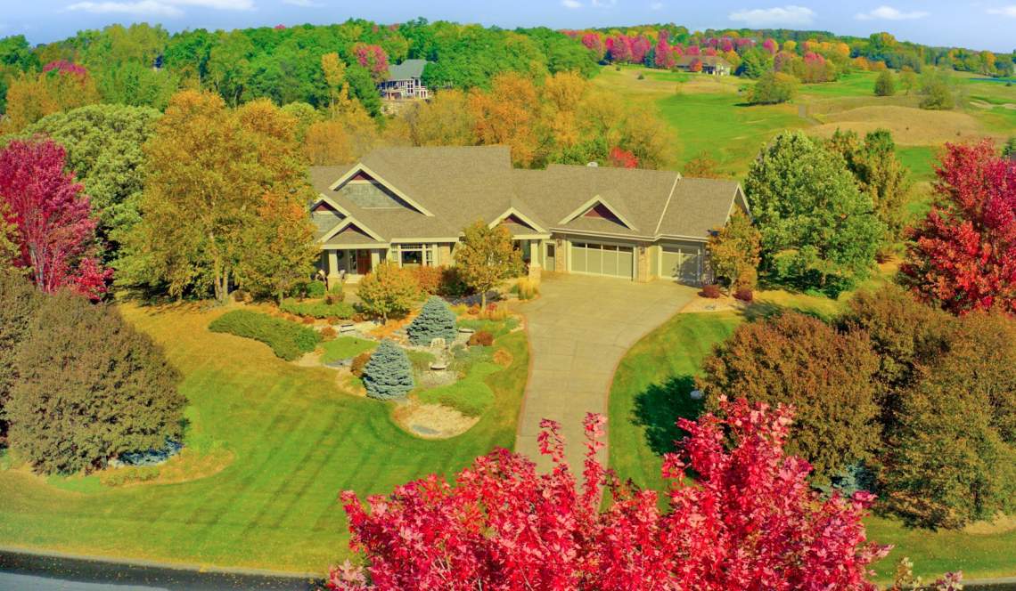 Fall aerial photo of home with golf course