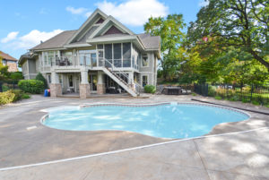 Luxury home with pool marketed well in Hudson WI for sale