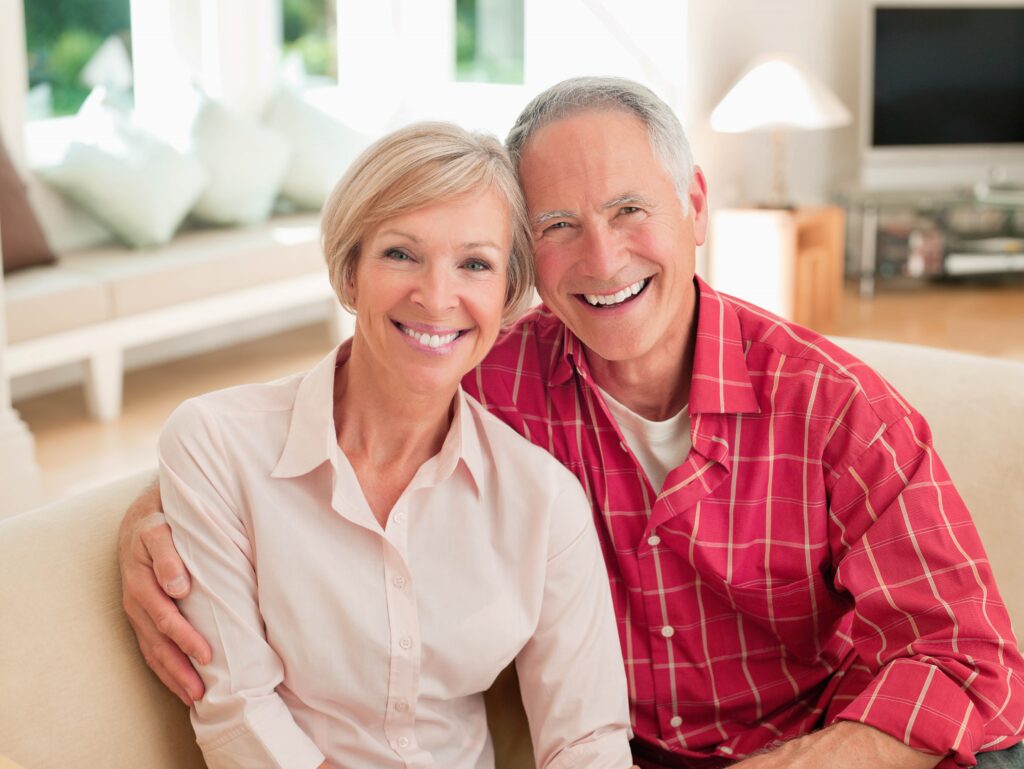 Elderly couple laughing 